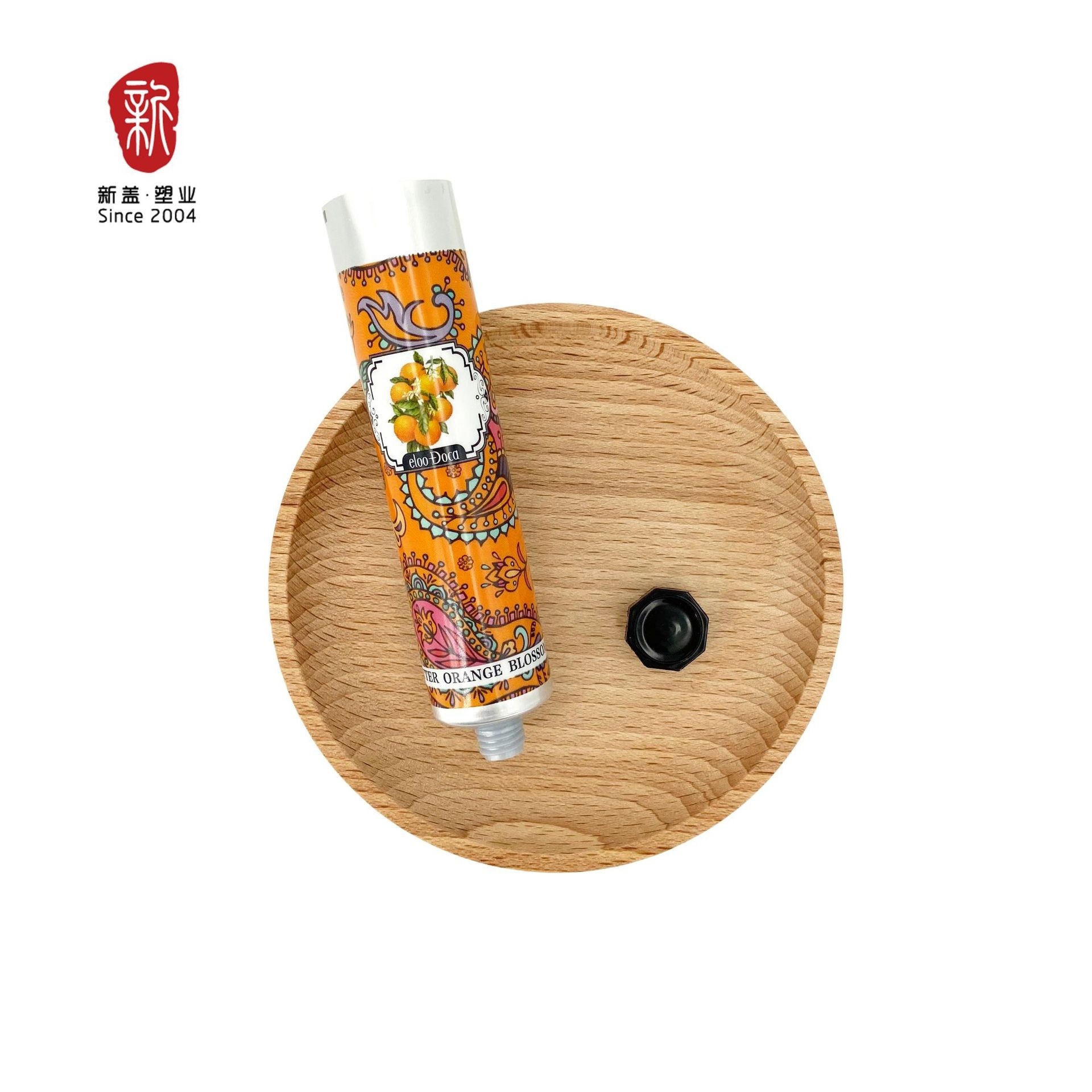 25铝塑护手霜管配八角盖